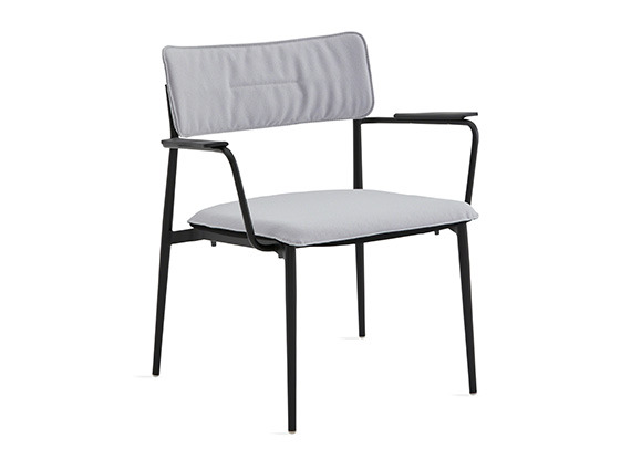 simple lounge chair with white cushion and black base